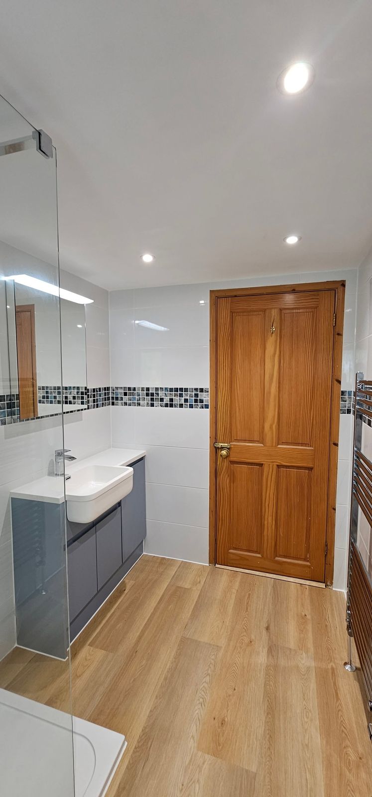 The finished bathroom looking back towards the wooden door
